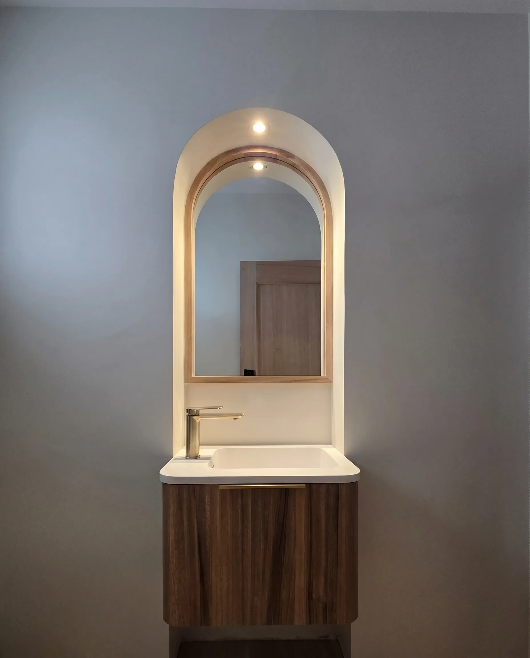 Contemporary spa-style bathroom renovation with modern finishes